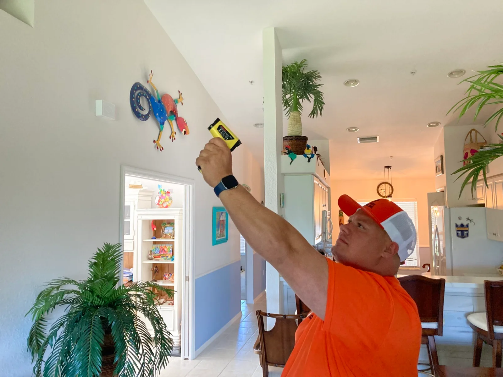 Steven Makepeace inspecting the interior of a Southwest Florida home